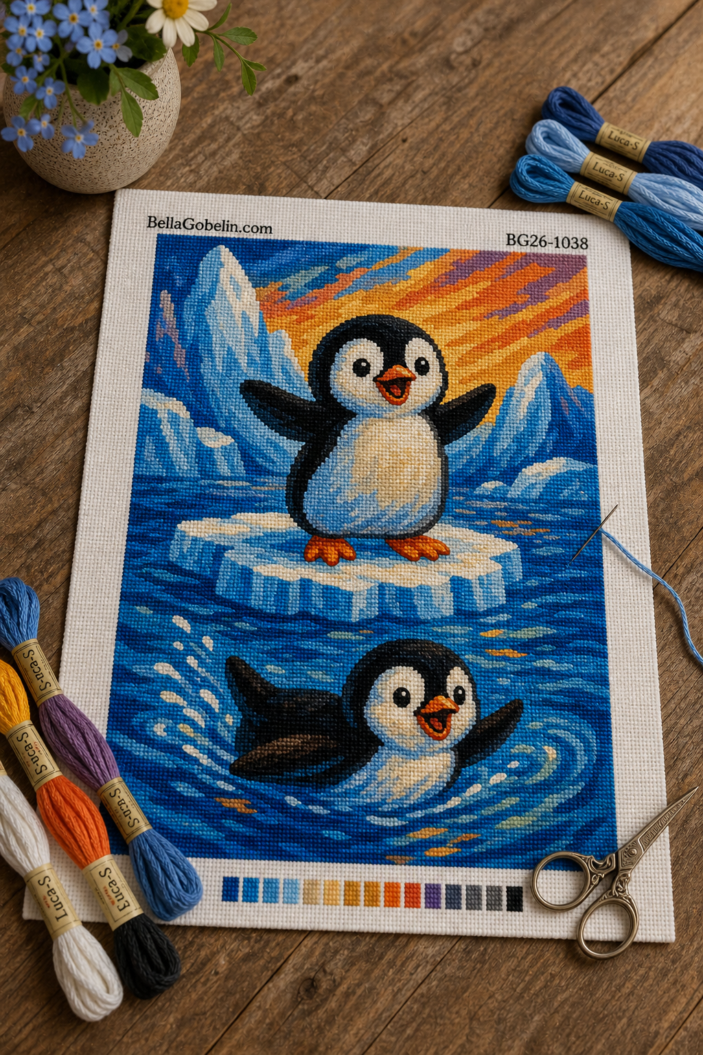 Pinguini veseli pe un câmp de gheață